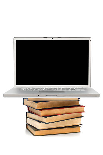 istock books and new laptop 176962956
