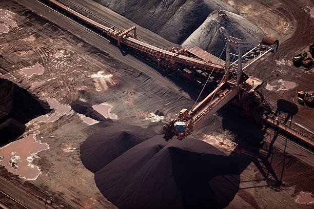 istock Bucket-wheel excavator in a harbor 176963066