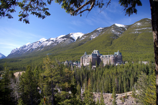 A majestic hotel in the Spray valley in front of the Sundance range in Banff National Park