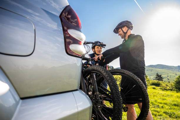 istock Couple taking out electric bikes from car 1769636009