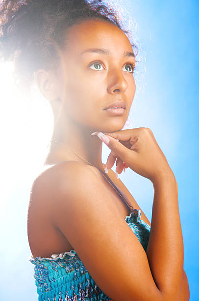 istock woman on sky background 176963702
