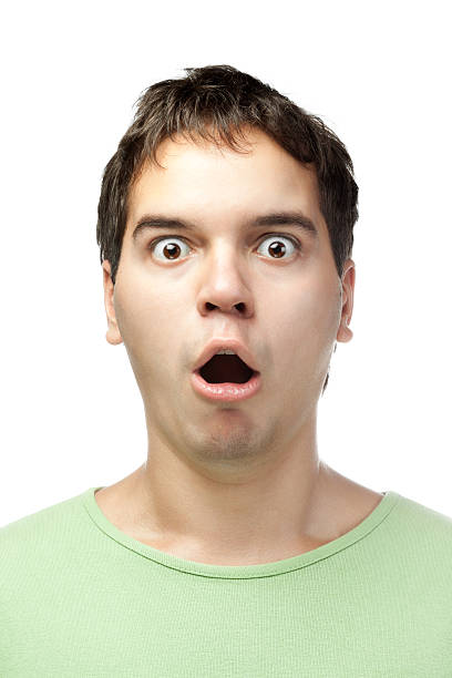 istock amazed young man funny portrait isolated on white background 176963857