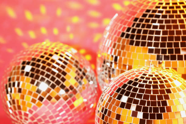 istock Many shiny disco balls on pink background 1769640412