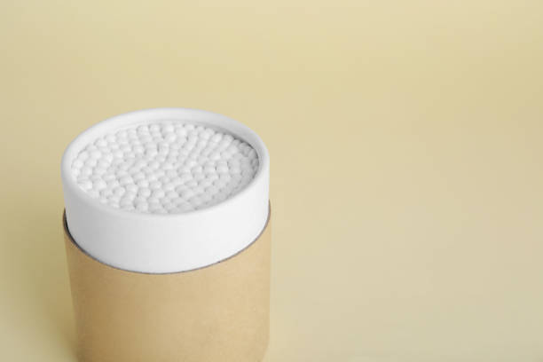 istock Container with new cotton buds on beige background. Space for text 1769640941