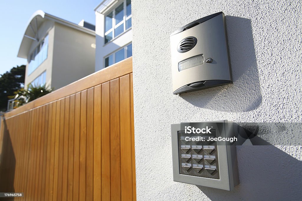 House Call Call box and digitally coded gate lock for new house Security System Stock Photo