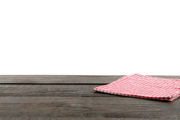 istock Napkin on wooden table against white background. Space for text 1769661076