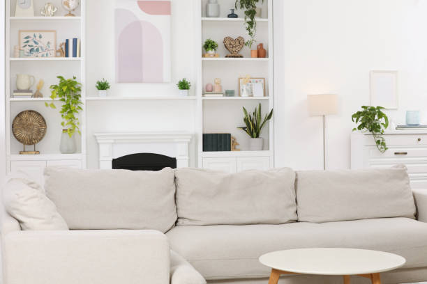 istock Stylish living room interior with comfortable sofa and side table 1769668537