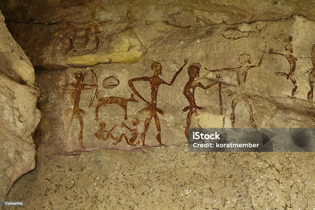 Archeological pre-historic human clift paint Archeological pre-historic human clift paint over 4000 years ago, Nakhonratchasima, Thailand. Cave Painting Stock Photo