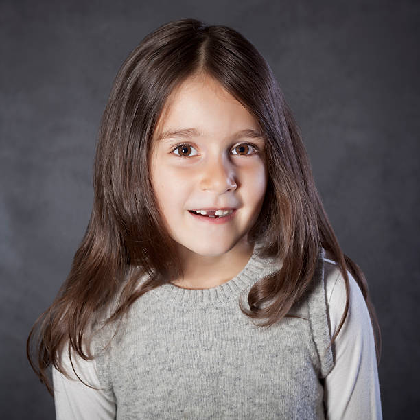 istock Smiling girl without a tooth 176967013