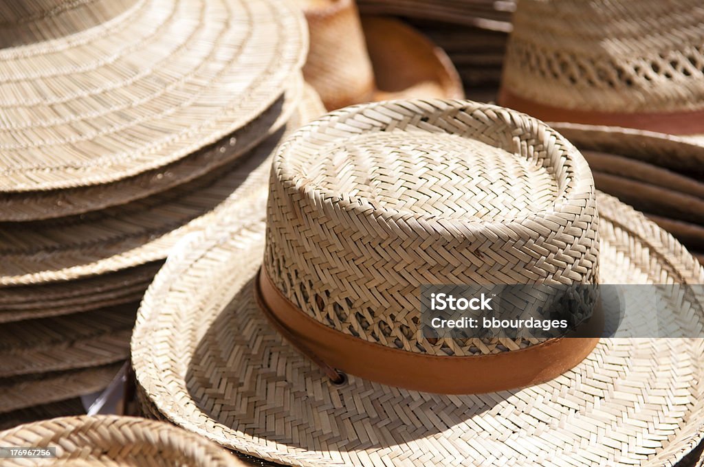 Straw Hats for Sale Straw Hats for Sale at a market At The Edge Of Stock Photo