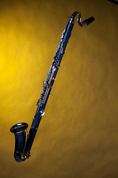 istock Bass Clarinet Isolated On Yellow 176967299