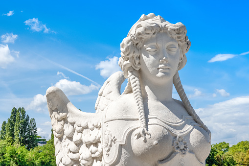 Vienna, Austria - August 8, 2023: Antique Sphinx sculpture in the Belvedere Gardens at Belvedere Palace