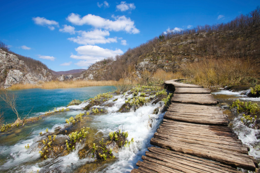 Wooden pathway over the falls at plitvice lakes in croatia