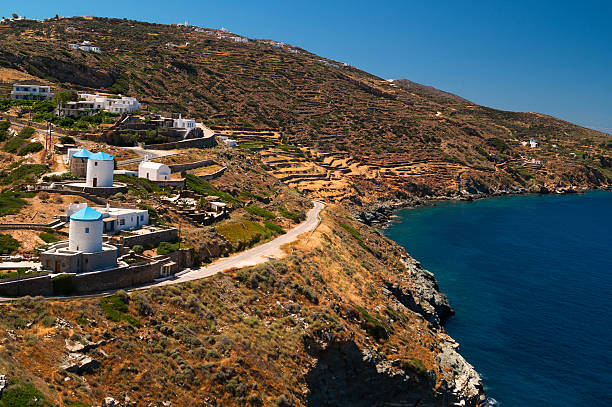 istock Panoramic view with windmills at Sifnos island in the cyclades 176974170