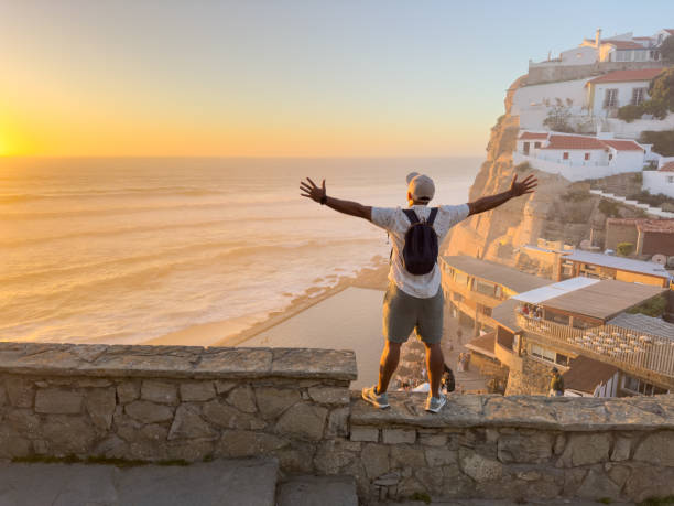 istock Man enjoys sunset in Sesimbra Portugal 1769749264