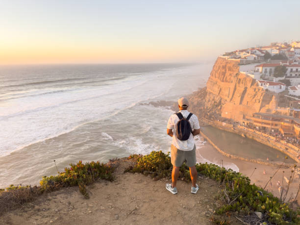 istock Man enjoys sunset in Sesimbra Portugal 1769749267