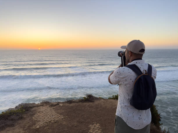 istock Man photographs sunset in Sesimbra 1769749271