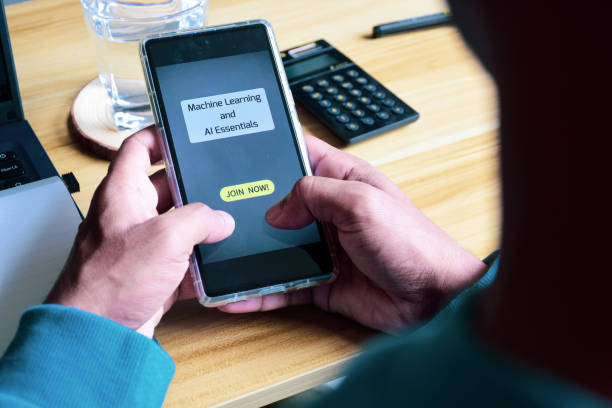 istock Man decision making moment to upskill himself by joining Artificial intelligence and Machine learning courses. Selective focus on the smartphone screen. 1769762283