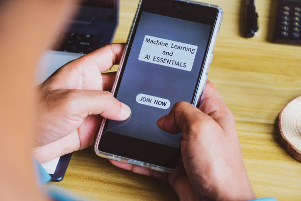 istock Man decision making moment to upskill himself by joining Artificial intelligence and Machine learning courses. Selective focus on the smartphone screen. 1769762805