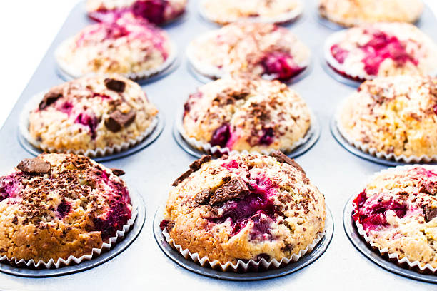 istock Homemade chocolate small cakes with cherry  in baking tray. Clos 176976330