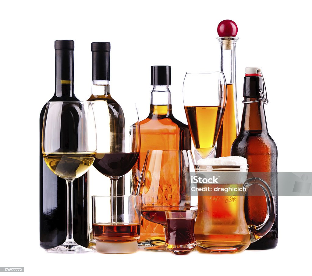 Different alcoholic drinks different bottles and glasses of alcoholic drinks isolated on a white background Alcohol - Drink Stock Photo