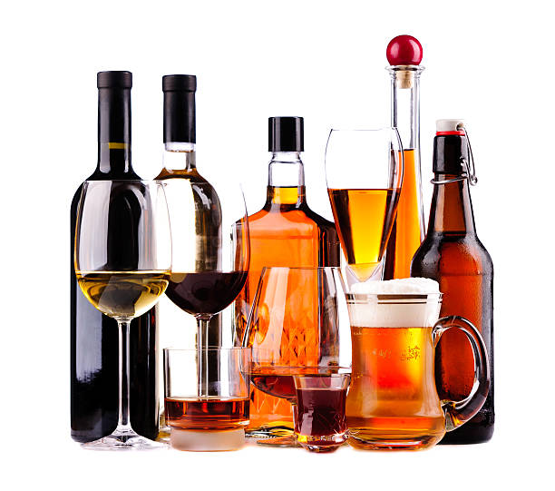 Different alcoholic drinks different bottles and glasses of alcoholic drinks isolated on a white background alcohol stock pictures, royalty-free photos & images
