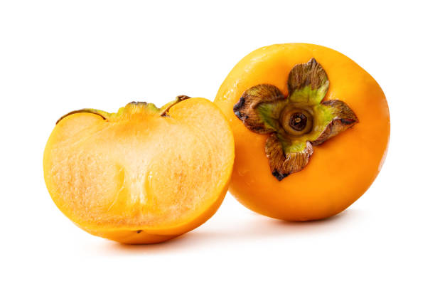 istock Fresh orange ripe persimmon with half isolated on white background with clipping path 1769780230
