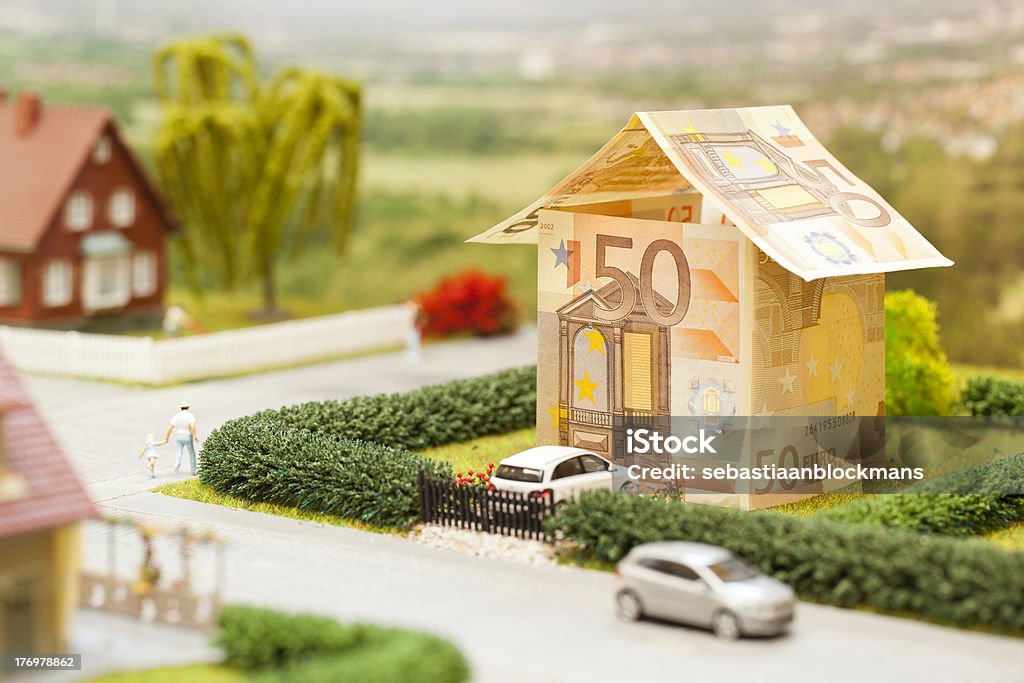 Euro house scenery a euro bill house in a green neighbourhood scenery House Stock Photo