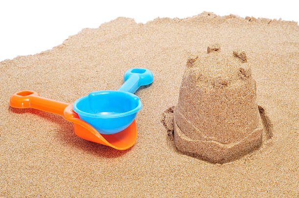 istock sandcastle and beach shovels 176979269