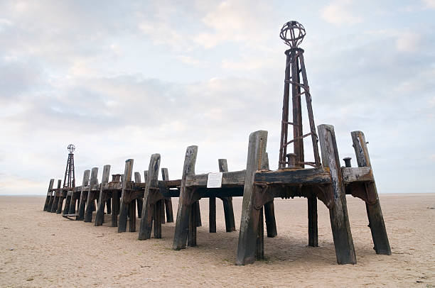 Old pier "Old pier on the beech at Lytham St Annes, Lancashire" lytham st. annes stock pictures, royalty-free photos & images