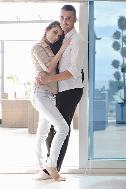 istock happy young couple relax at home 176981963