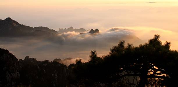 istock Sunrise in Huangshan mountain 176982117