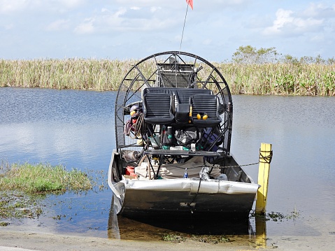 Boynton Beach, Palm Beach County, Florida, USA, October 31, 2023. Airboat provides aquatic plant management.