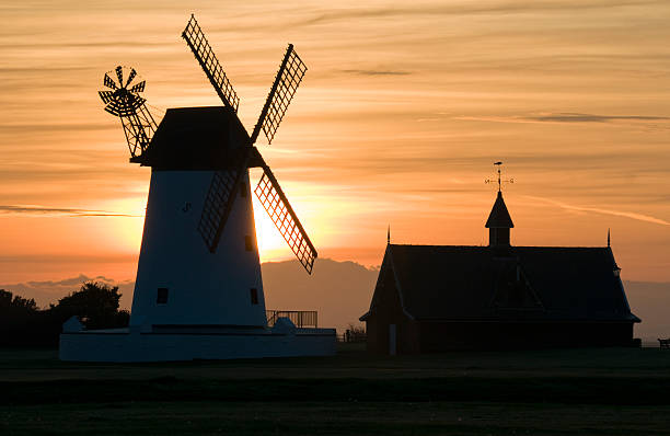 WIndmill at dawn Lytham St Annes windmill and old lifeboat house on the Fylde coast in Lancashire at dawn lytham st. annes stock pictures, royalty-free photos & images
