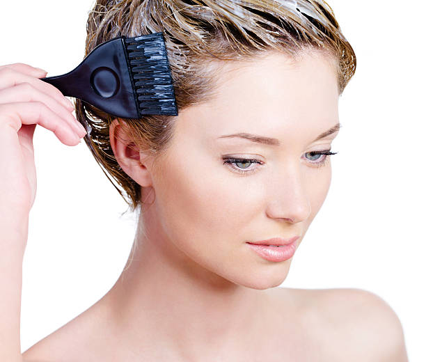 istock Woman coloring her hair 176984001