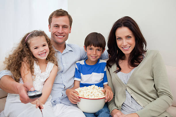 istock Family watching a movie together 176984453