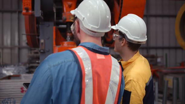 istock Engineer and technician discussing machinery in factory to plan inspection maintenance according to usage cycle, Concepts inspections based on usage cycle maintenance 1769847820