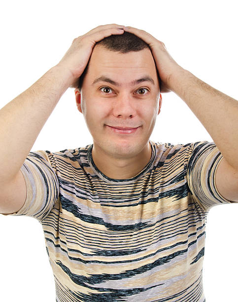 istock Portrait of man  keeping hands for the head 176985590