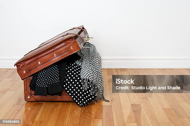 Polka Dot Clothing In A Retro Suitcase Stock Photo - Download Image Now - Business Travel, Packing, Bag