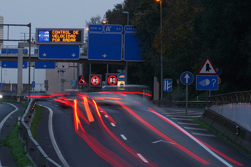 highway with speed limit and radar in Santander, Spain. Long exposure picture