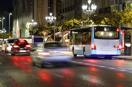 urban bus with space to place advertising or advertisements. Long exposure photography