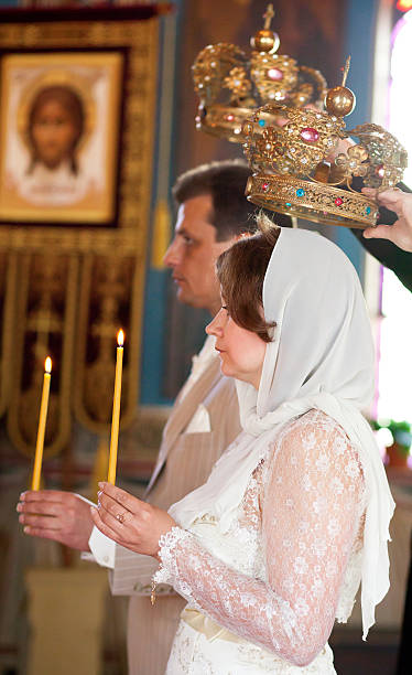 istock Bride and groom during orthodox wedding ceremony 176986380