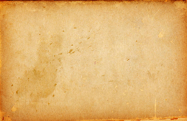 istock Old yellowed damaged paper 176986628