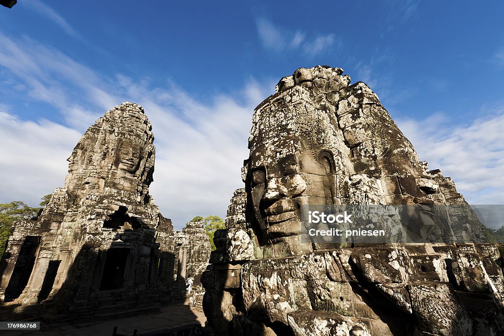 Famous Angkor Wat head statues Cambodia "Famous Angkor Wat head statues SIEM REAP, CAMBODIA" Angkor Wat Stock Photo