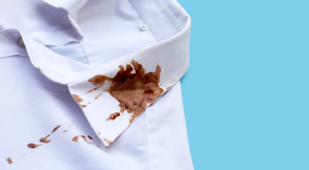 istock Dirty choclate stain on white shirt 1769869991