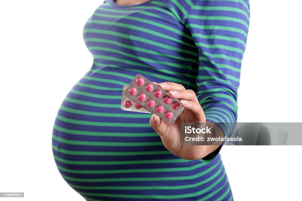 Cuidado Prenatal con vitaminas - Foto de stock de Abdomen libre de derechos