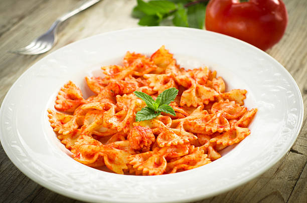 istock Farfalle with shrimps and tomato sauce 176987094
