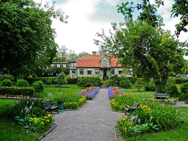 istock Garden and wooden house 176987594