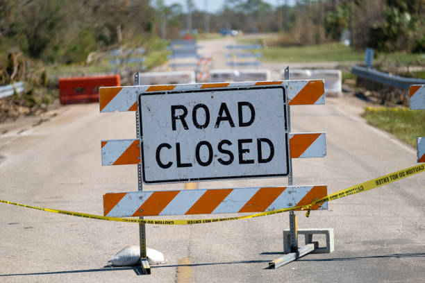 istock Yellow protective barrier at street construction site. Warning road sign about utility work 1769876431