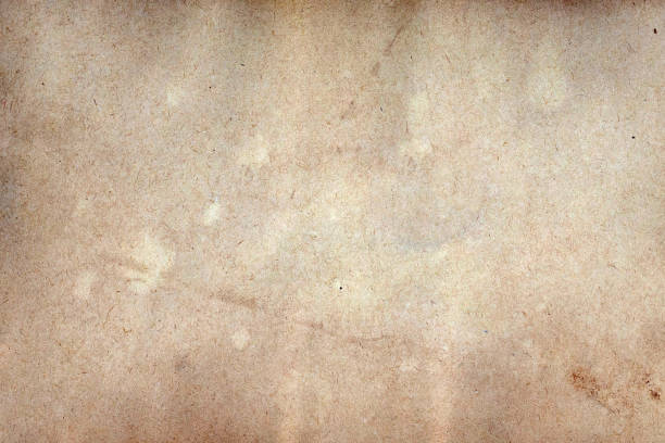istock Old brown paper grunge background. Abstract liquid coffee color texture. 1769876991